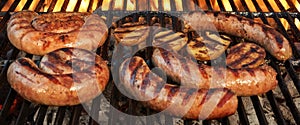 Grilling German Sausages On Hot Barbecue Charcoal Grill.