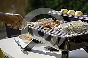 Grilling on a hybrid grill barbecue for electric or charcoal