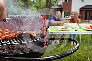 Grilling meat on a barbecue