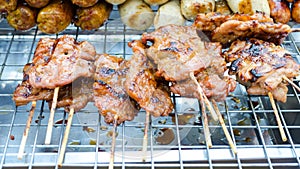 grilling pork in local market