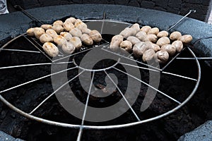 Grilling potatoes on volcanic steam Lanzarote
