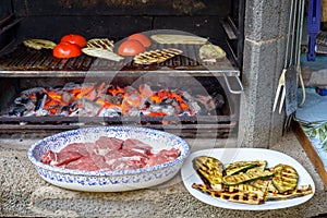 Grilling vegetables in barbecue