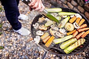 Grilling vegetables outdoors, vegan barbecue