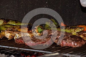 Grills and sweet peppers which cook on the barbecue