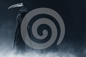 Grim reaper on dark backgrounds