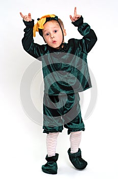 Grimacing boy in costume