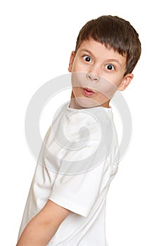 Grimacing face boy portrait, teenager closeup