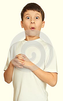 Grimacing face boy portrait, teenager closeup