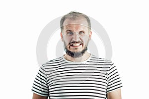 A grin bearded adult man in a striped T-shirt. 30-35 years old. Isolated on white