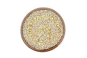 Grind wheat in a wooden dish