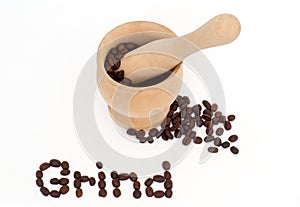 Grind word & coffee beans,mortar,& pestle on white