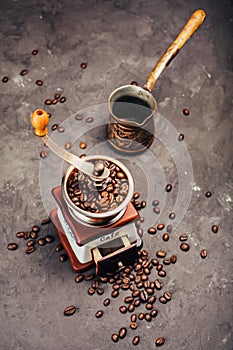 Grinder, cezve and coffee beans