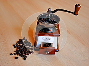 Grinder and coffee grain