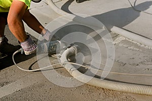 Grinding concrete between curb and pavement