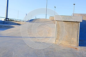 Grinding edge rail in skatepark photo