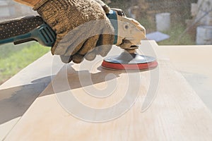 Grinding of an oak board with an angle grinder