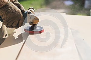 Grinding of an oak board with an angle grinder