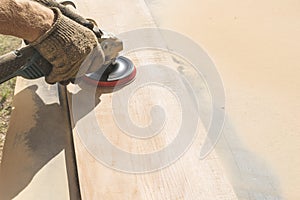 Grinding of an oak board with an angle grinder