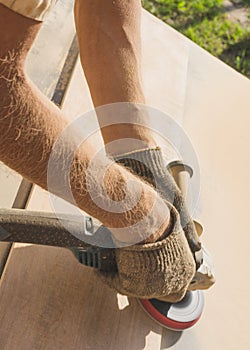 Grinding of an oak board with an angle grinder