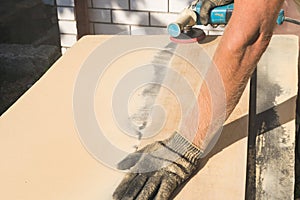 Grinding of an oak board with an angle grinder