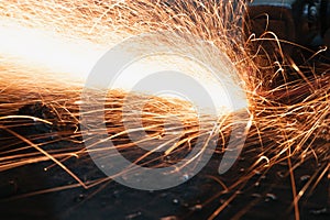 Grinding  sparks of air tools on steel in factory