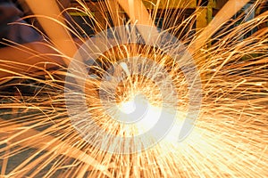 Grinding  sparks of tools on steel in factory