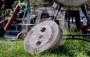 Grinding stone at a salvage yard