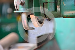 Grinding wheel on the machine close up with blur