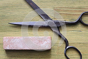 Grindstone with scissors photo