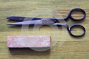 Grindstone with scissors photo