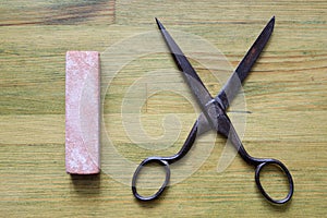 Grindstone with scissors photo