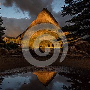 Grinnell Point Reflects In Puddle photo