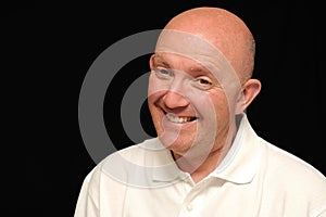 Grinning bald man photo