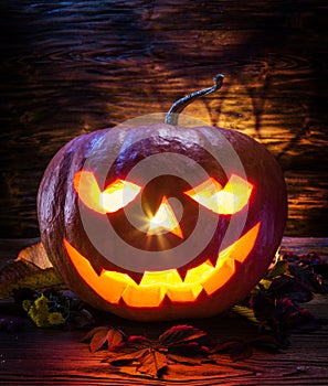 Grinning pumpkin latern or jack-o`-lantern is one of the symbols of Halloween. Halloween attribute