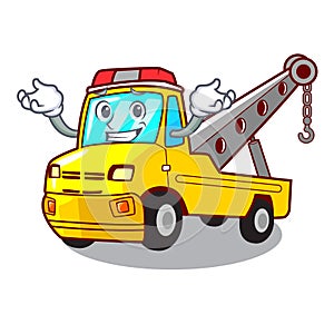 Grinning truck tow the vehicle with mascot