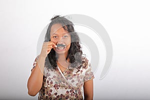 Grinning woman with mustache