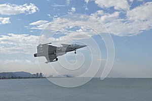 Gripen aircraft over the horizon.