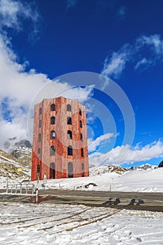 The red Julier Theater Tower on the Julier Pass (2284 m above sea level) in winter. photo