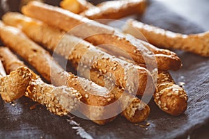Grissini - traditional Italian salty breadsticks sprinkled with