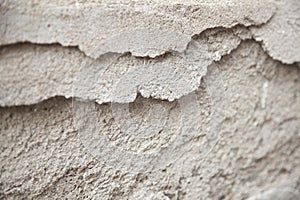 Gritty cement texture with some of it chipped off