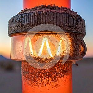 Gritty Construction Warning Light at Sunset