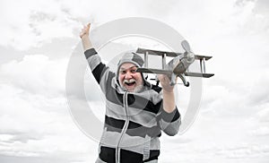 grizzle senior retired man. mature man at retirement. old man on sky background with toy plane