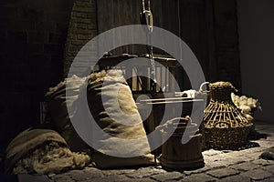 Groceries in sacks and baskets in a medieval warehouse