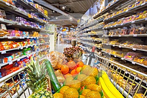 Grocery cart in supermarket