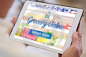 Grocery online shop to order food delivery from supermarket, Senior man hands using digital tablet for shopping grocery store