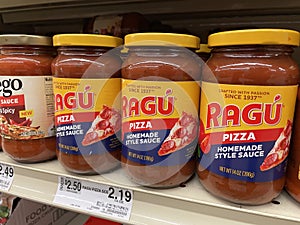 Grocery store Ragu pizza sauce in a glass jar