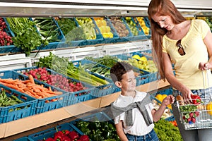 Grocery store - Red hair woman with child