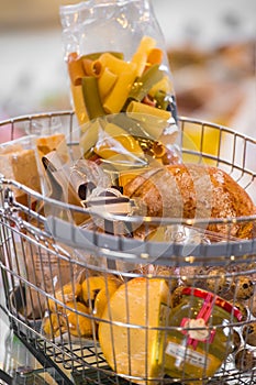 Grocery store. Supermarket basket full of different food