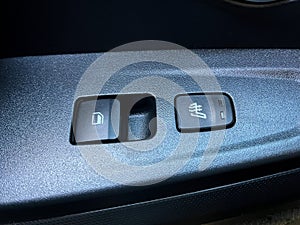 Grodno, Belarus - 10.29.2021: Interior of a Hyundai Creta 2021 or Hyundai ix25 car. Window opening and closing buttons, seat heati