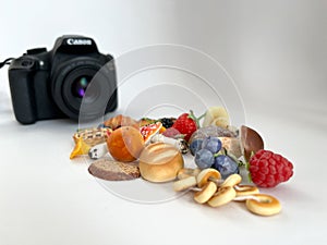 Grodno, Belarus - 03.06.2022: Canon camera in the process of shooting small objects